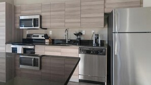 Fridge, dining tables - Landing | Beautiful 2BD, Pool, Yoga Studio (Clearwater)