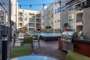 Outdoor dining - Landing | Modern 2BD, Gym, Clubhouse (Houston)