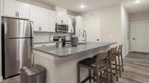 Fridge, dining tables - Landing | Chic 2BD, Gym (Port Royal)