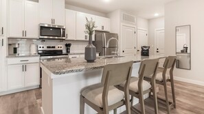 Fridge, dining tables - Landing | Stylish 2BD, Gym (Port Royal)