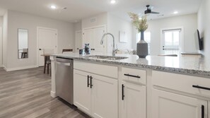 Fridge, dining tables - Landing | Chic 1BD, Gym (Port Royal)