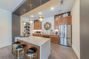Fridge, dining tables - Landing | Modern 1BD in Medical Center (San Antonio)