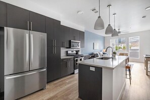 Fridge, dining tables - Landing | Spectacular 1BD in Central City (Salt Lake City)