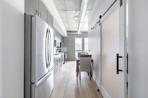 Fridge, dining tables - Landing | Spectacular Studio in Central City (Salt Lake City)