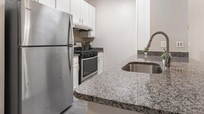 Fridge, dining tables - Landing | Amazing 1BD, Courtyard, Gym (Columbia)