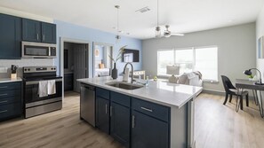 Fridge, dining tables - Landing | Chic 2BD in Grand Prairie (Grand Prairie)