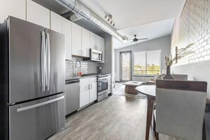 Fridge, dining tables - Landing | Incredible 1BD, Yoga Studio, Gym (Bellview)