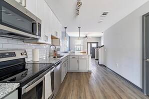 Fridge, dining tables - Landing | Spectacular 2BD, Gym, Pool (Bellview)