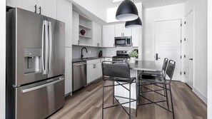 Fridge, dining tables - Landing | Amazing 1BD, Gym (Austin)