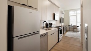 Fridge, dining tables - Landing | Modern Studio in Lincoln Park (Chicago)