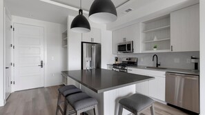 Fridge, dining tables - Landing | Stunning 1BD, Gym (Austin)