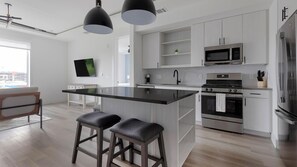 Fridge, dining tables - Landing | Incredible 1BD, Gym (Austin)