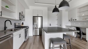 Fridge, dining tables - Landing | Incredible 1BD, Gym (Austin)