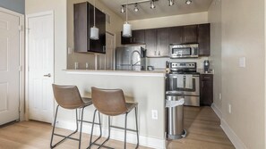 Fridge, dining tables - Landing | Stunning 1BD, Gym (Austin)