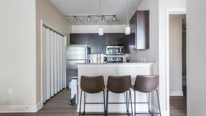 Fridge, dining tables - Landing | Incredible 1BD, Gym (Austin)