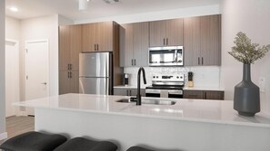 Fridge, dining tables - Landing | Chic 1BD, Clubhouse, Gym (Goodyear)