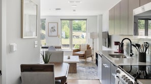 Fridge, dining tables - Landing | Chic Studio, Gym (Nashville)