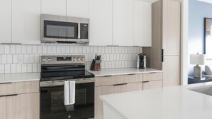Fridge, dining tables - Landing | Stunning 1BD, Gym, Game Room (Chapel Hill)