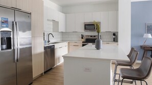 Fridge, dining tables - Landing | Stylish 1BD, Courtyard, Game Room (Chapel Hill)