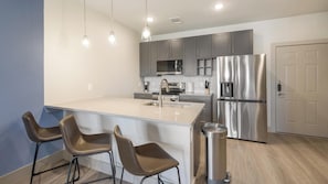 Fridge, dining tables - Landing | Modern 1BD, Clubhouse, Game Room (Mansfield)