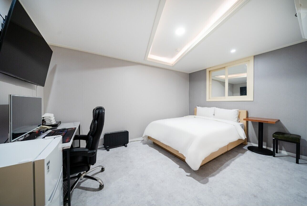 Down duvets, memory-foam beds, desk, free WiFi