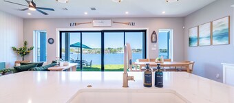 Lakefront Home w/ Rooftop Patio, Private Dock, Fire Pit & Outdoor Kitchen