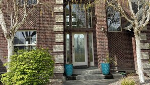 A brick building with a herringbone pattern, large windows, and a central entrance. - Lakefront Escape Near Gorge Amphitheater (Moses Lake)