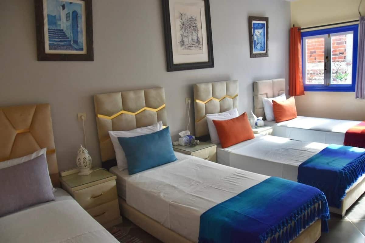 Comfort Quadruple Room, Patio, Garden View | Blackout drapes, soundproofing, iron/ironing board, free WiFi