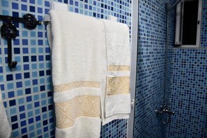 Comfort Quadruple Room, Patio, Garden View | Bathroom | Combined shower/tub, hair dryer, slippers, towels - bluemoon house (Chefchaouen)