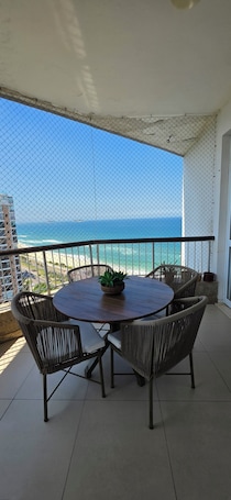 Outdoor dining. Luxury Oceanfront Duplex Penthouse • Private Heated Pool • Panoramic Views