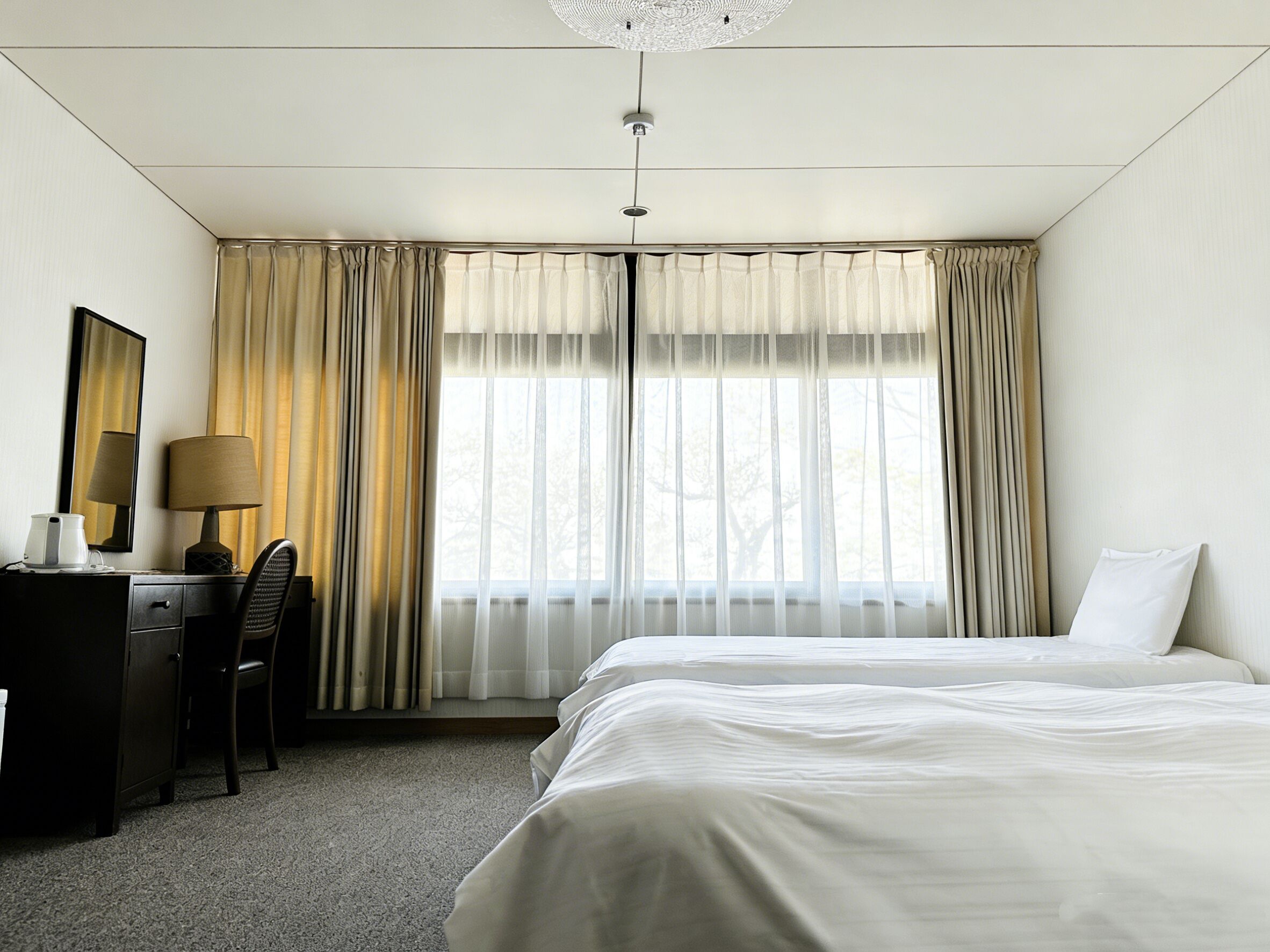 Quarto duplo clássico, vista para o pátio