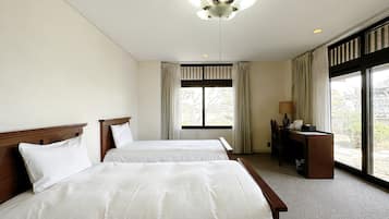 Kamar Twin Klasik, pemandangan halaman | Tirai kedap cahaya dan Wi-Fi gratis