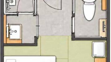 Plano de un cuarto de hotel con baño, kitchenette y una cama.