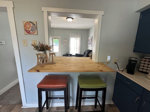 Clean 2 bedroom bungalow with comfortable furniture and a gaming table!