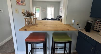 Clean 2 bedroom bungalow with comfortable furniture and a gaming table!
