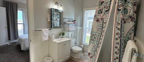 Hair dryer, towels, soap, toilet paper