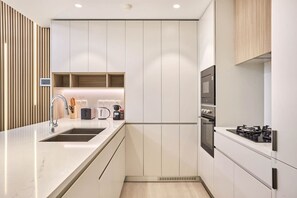 Private kitchen - Stylish 1-Bedroom Apartment in MBR City | Modern Comfort & Elegance (Dubai)