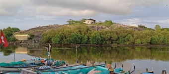 • Just 50 steps Papanasini riverbank.  To the right,  Padukare Beach,