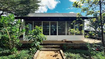Standard Shared Dormitory, Mixed Dorm, Patio, Garden View | In-room safe, desk, laptop workspace, blackout drapes