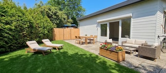 Cozy home in a holiday park with a swimming pool