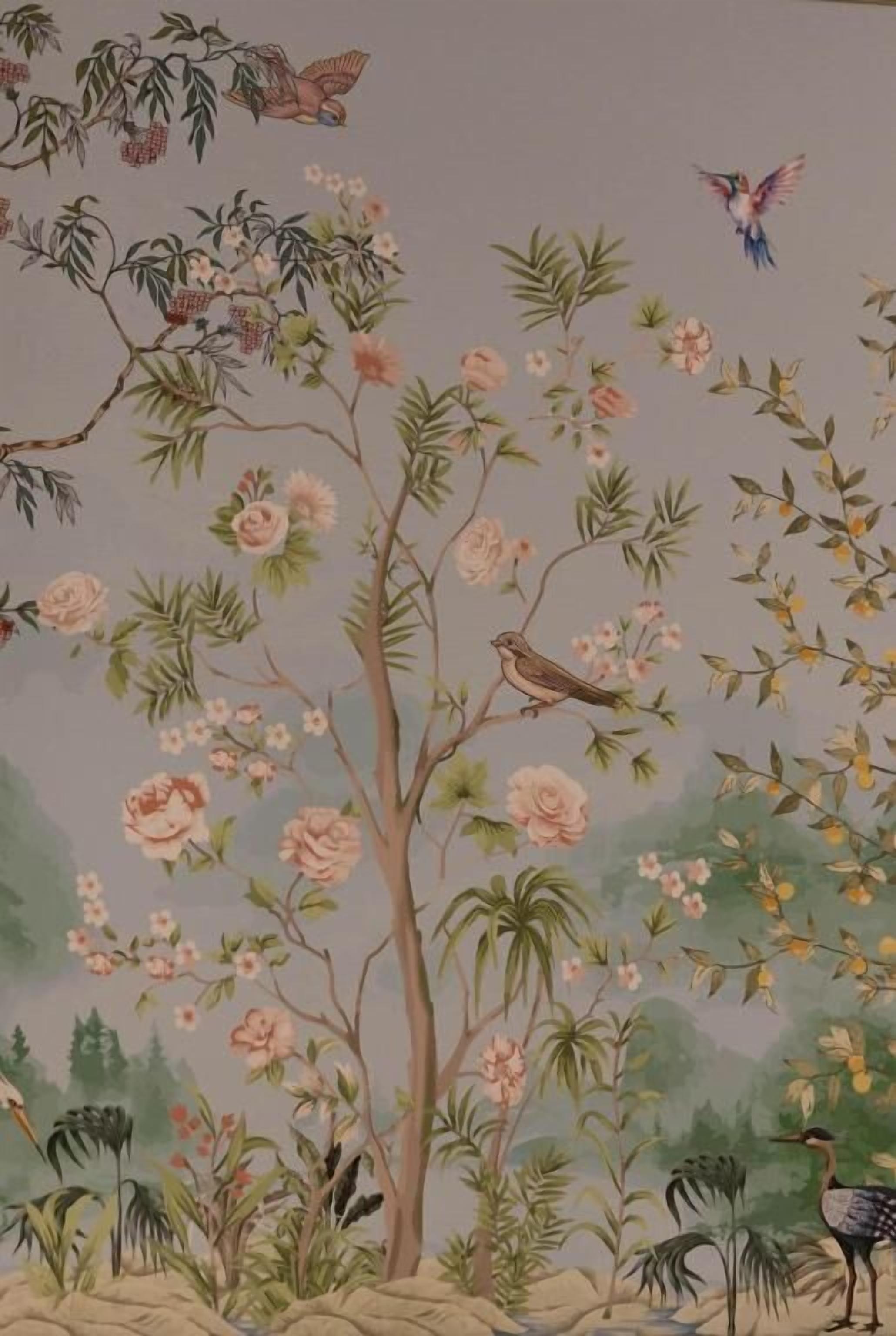 A painting of a tree with birds and flowers.