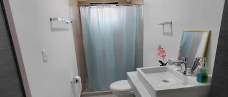 Hair dryer, towels, soap, toilet paper