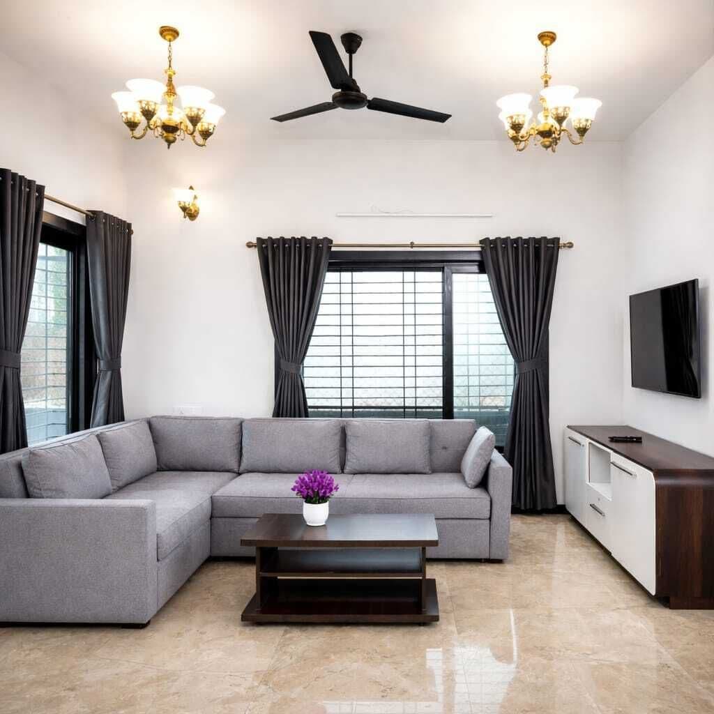 Luxury Villa | Living area | 40-inch LCD TV with cable channels