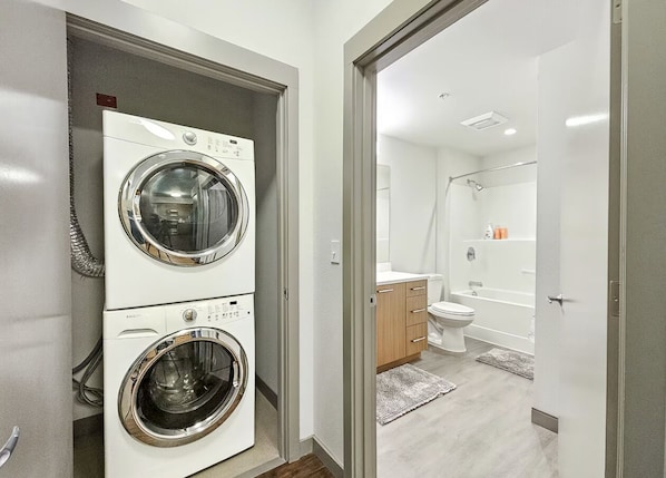 Hair dryer, towels, soap, toilet paper