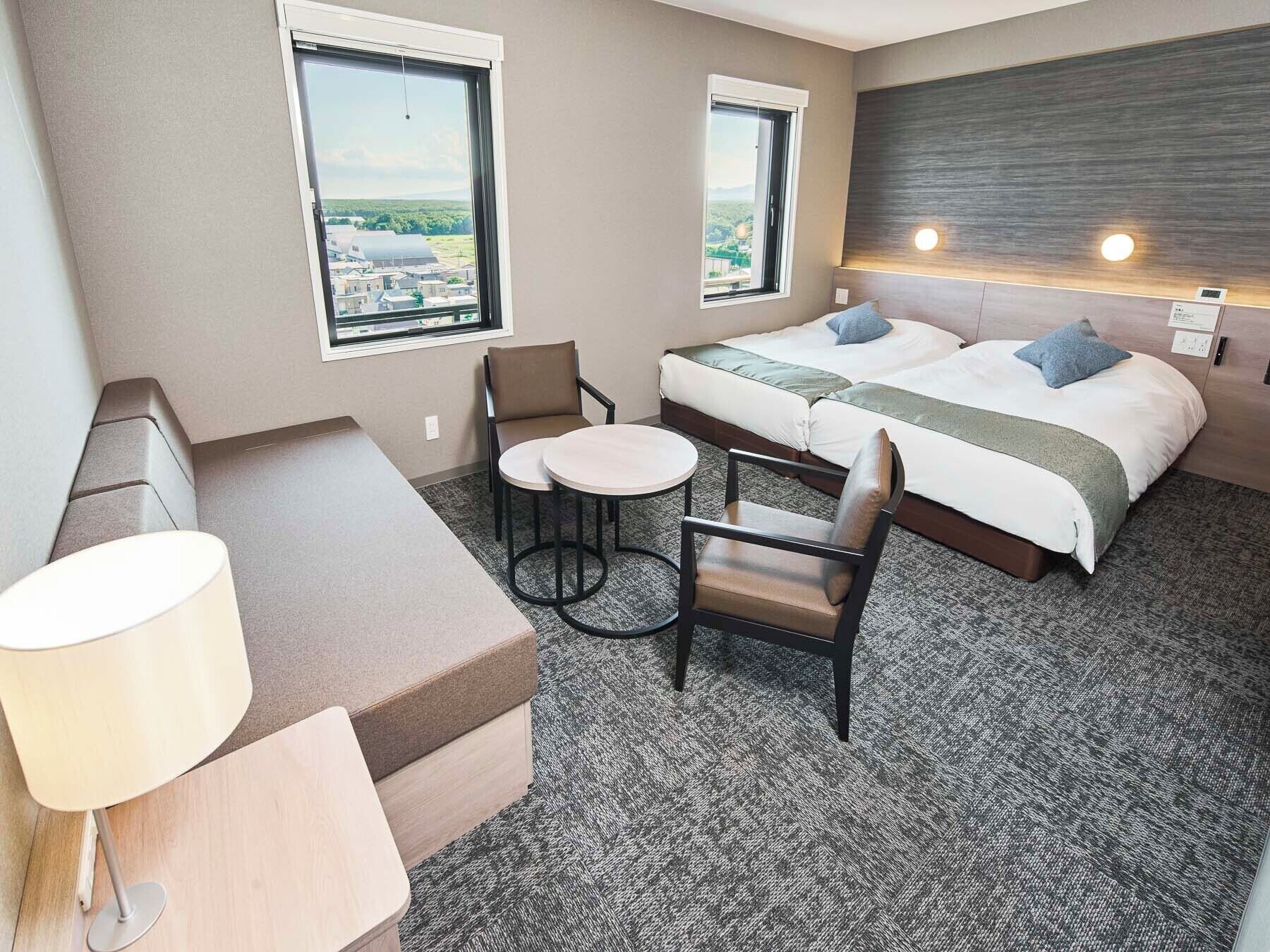 Deluxe Twin Room, Non Smoking | Desk, iron/ironing board, free WiFi