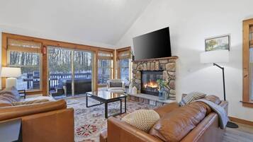 Smart TV, fireplace, foosball