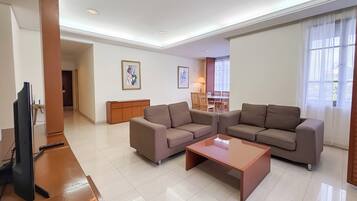 Apartamento, 2 quartos | Área de estar