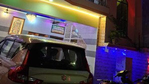 A multi-story building with a sign for 'Gopal Kunj Home Stay.' - Gopalkunj Homestay (Faizabad)