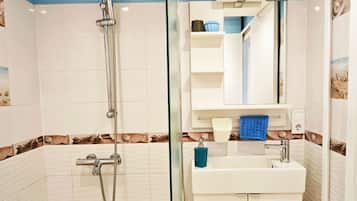 Hair dryer, towels, soap, shampoo