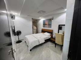 Family Room, Balcony, City View | In-room safe, desk, laptop workspace, blackout drapes